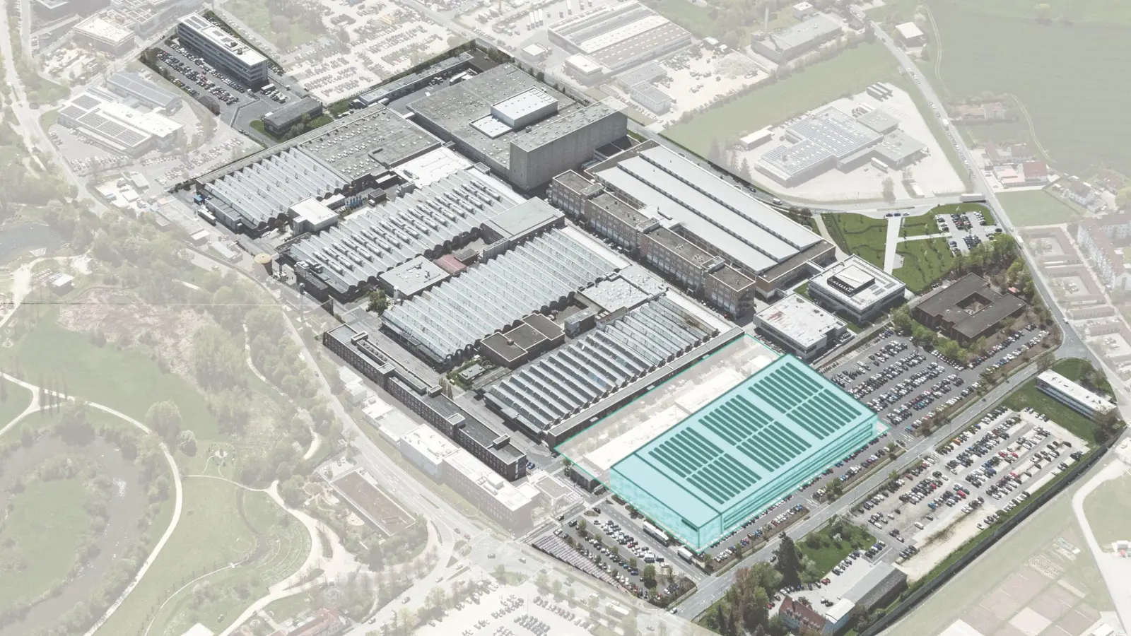 Die neue Fabrik (farblich gekennzeichnet) soll auf dem jetzigen Parkplatz vor dem Haupteingang entstehen. (Bild: Siemens AG)